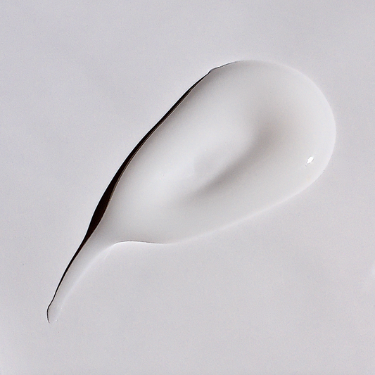 Upclose texture swipe of white hyaluronic acid serum.