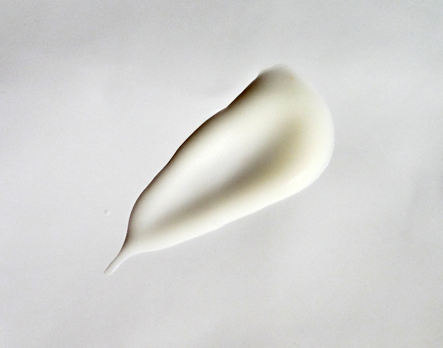 Off white to yellow cranberry cream swipe close up