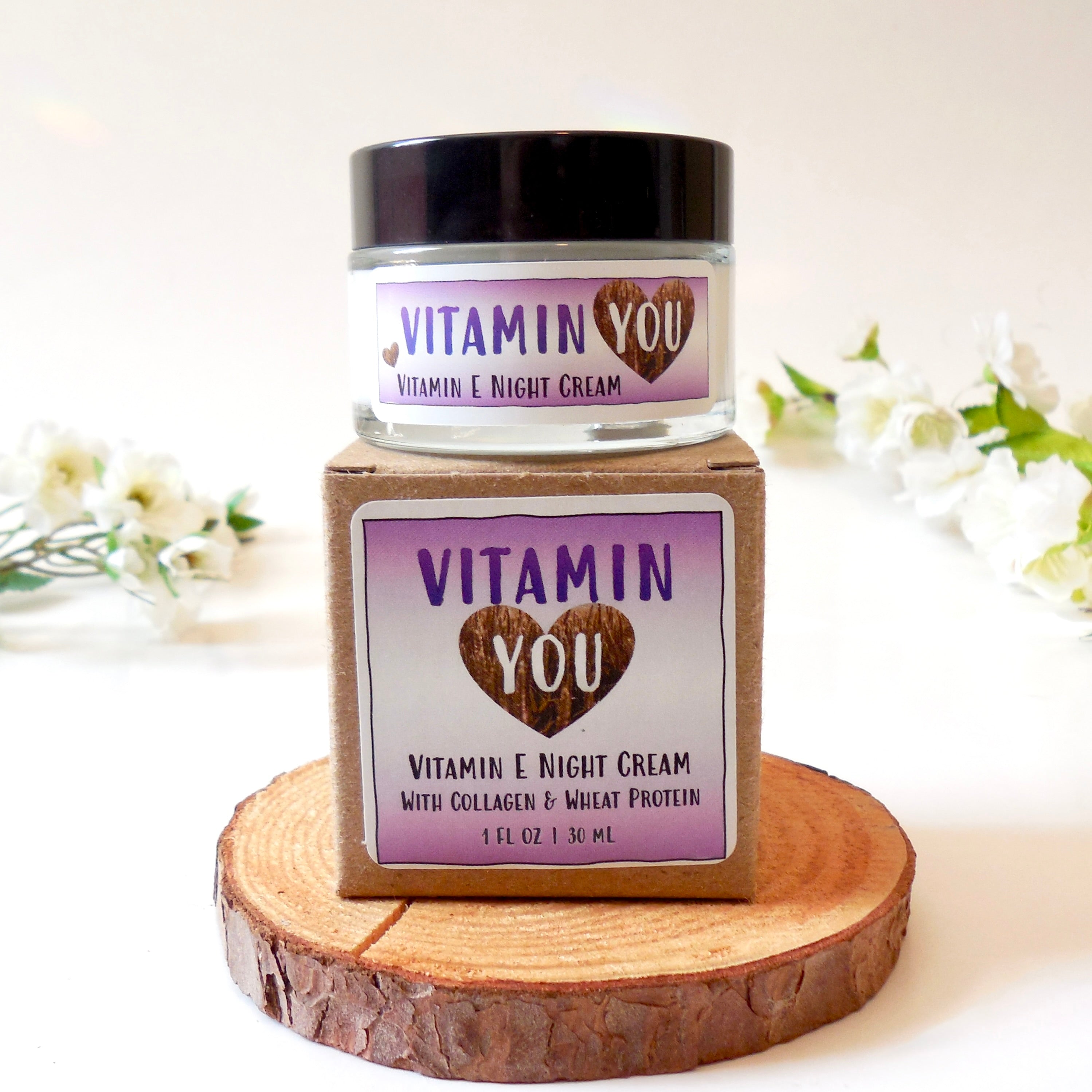 Vitamin You Vitamin E Night Cream jar and box with a purple theme